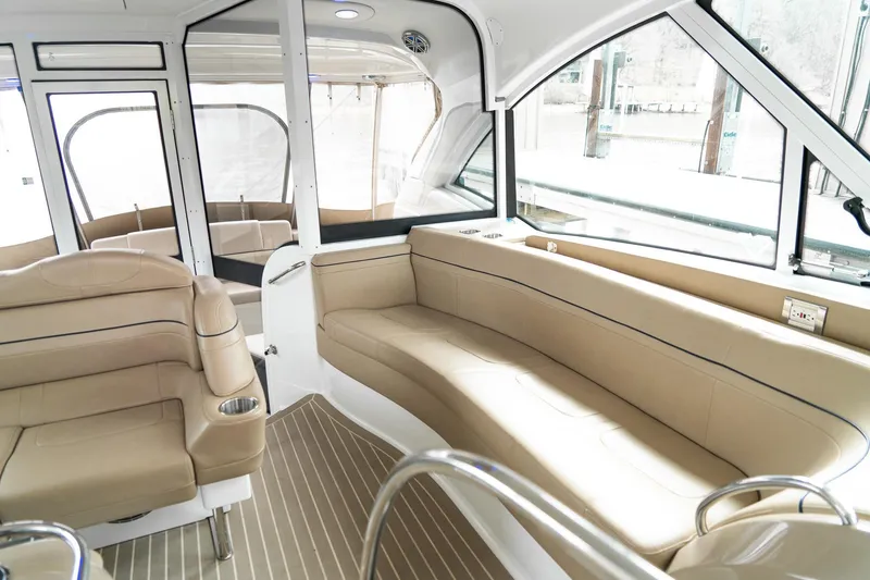 Slide: The Image of Luxurious interior of a 2016 Formula 45 Yacht with beige leather seating. - 24