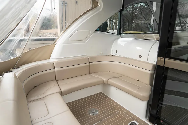 Slide: The Image of Luxurious seating area on a 2016 Formula 45 Yacht with beige upholstery. - 32