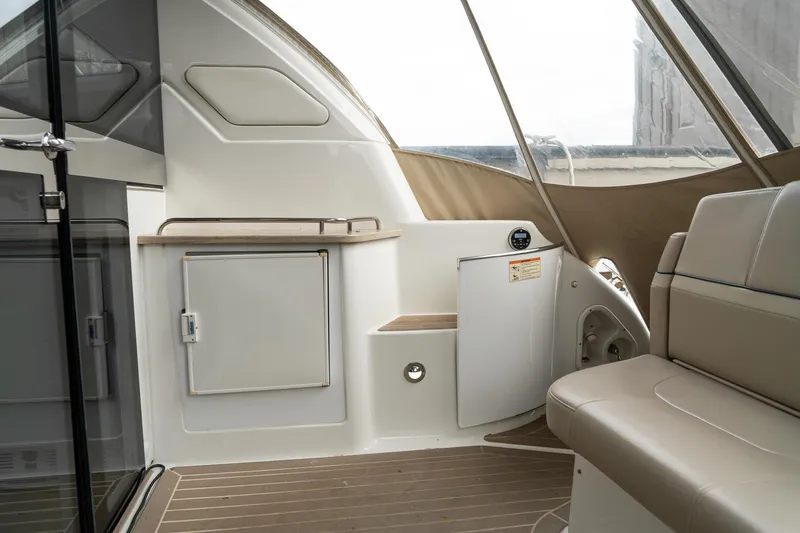 Slide: The Image of Interior of 2016 Formula 45 Yacht, featuring sleek seating and modern cabinetry. - 35