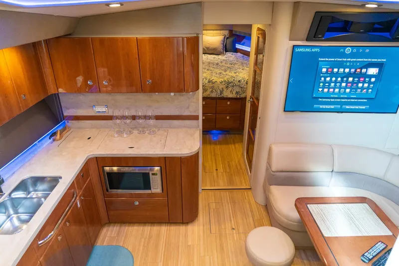 Slide: The Image of Luxurious interior of 2016 Formula 45 Yacht featuring modern kitchen and cozy seating area. - 36