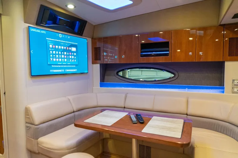 Slide: The Image of Luxurious interior of 2016 Formula 45 Yacht with TV, seating, and dining table. - 39