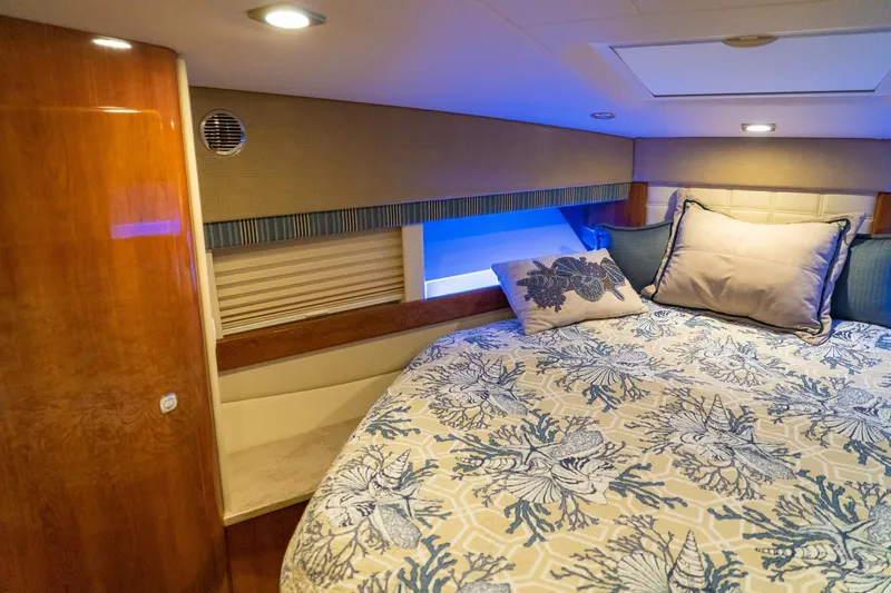 Slide: The Image of Luxurious cabin interior of 2016 Formula 45 Yacht with elegant bedding and ambient lighting. - 54