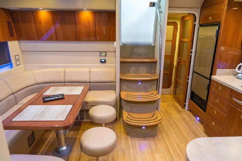 Slide: The Image of Luxurious interior of a 2016 Formula 45 Yacht with elegant seating and wooden finishes. - 57