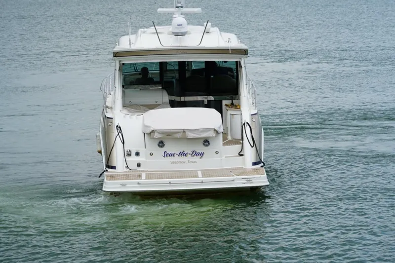 Slide: The Image of 2016 Formula 45 Yacht cruising on calm waters, rear view. - 8