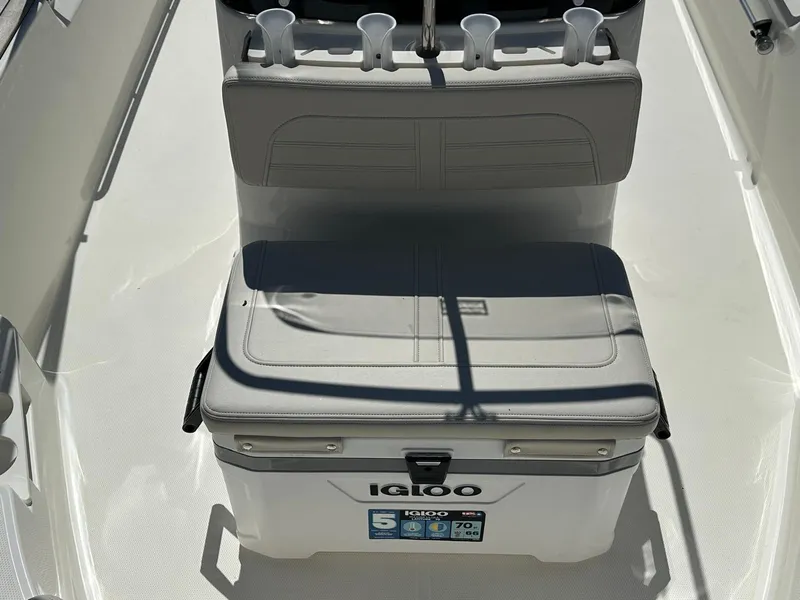 Slide: The Image of The 2027 Boston Whaler 170 Montauk features a bench seat with an integrated cooler. - 8