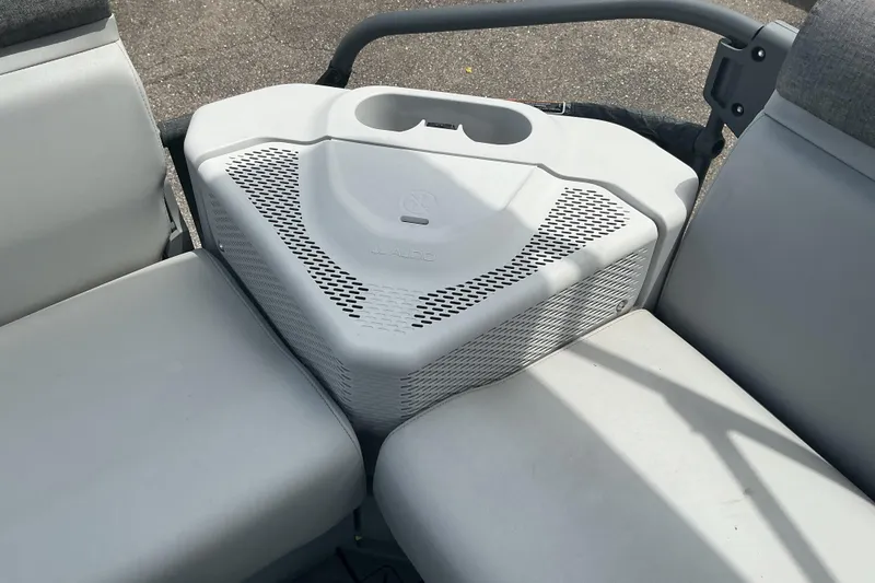 Slide: The Image of 2023 Sea-Doo Switch Sport Compact seating area with integrated JL Audio speaker system. - 10