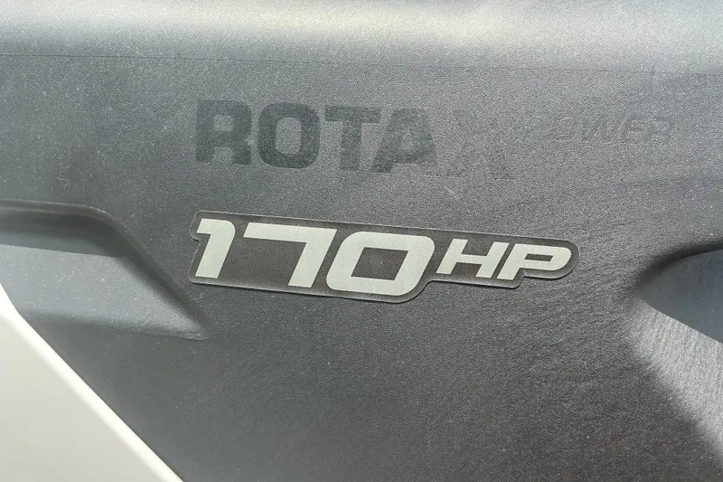 Slide: The Image of Close-up of 2023 Sea-Doo Switch Sport Compact, featuring 170 HP Rotax engine. - 5