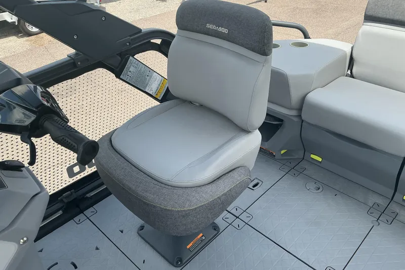 Slide: The Image of 2023 Sea-Doo Switch Sport Compact interior with comfortable seating and modern design. - 8
