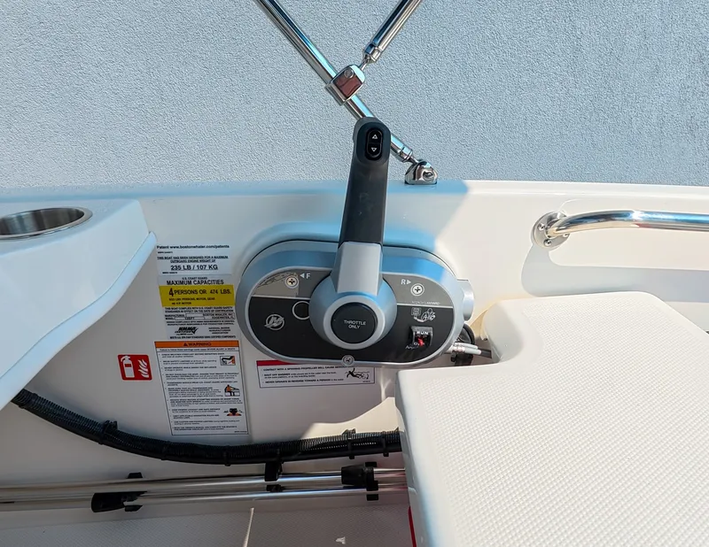 Slide: The Image of The image shows the control panel of a 2027 Boston Whaler 130 Super Sport. - 10