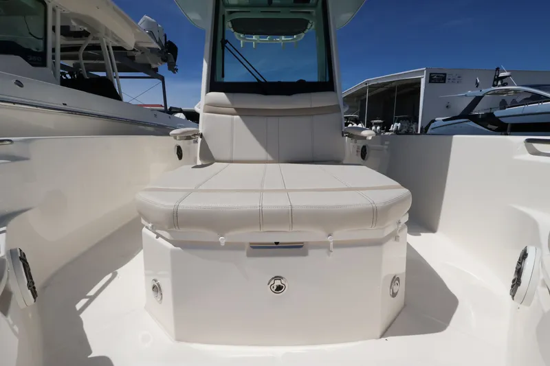 Slide: The Image of The 2027 Boston Whaler 280 Dauntless features a spacious seating area at the bow. - 19