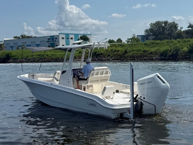Slide: The Image of A 2027 Boston Whaler 250 Dauntless cruising on calm waters. - 3