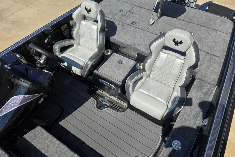 Slide: The Image of 2026 Phoenix 921 Elite X boat interior with luxurious gray seating and sleek design. - 9