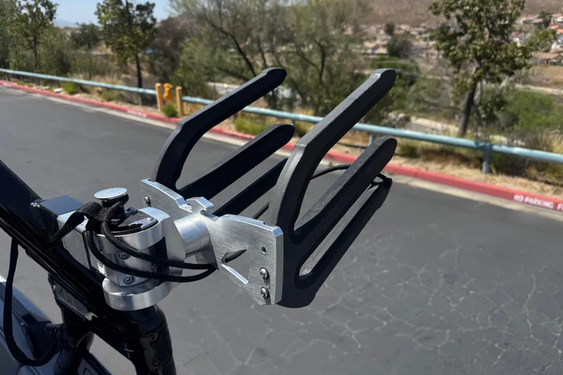 Slide: The Image of Close-up of a 2022 Moomba Max wakeboard rack on a sunny day. - 14