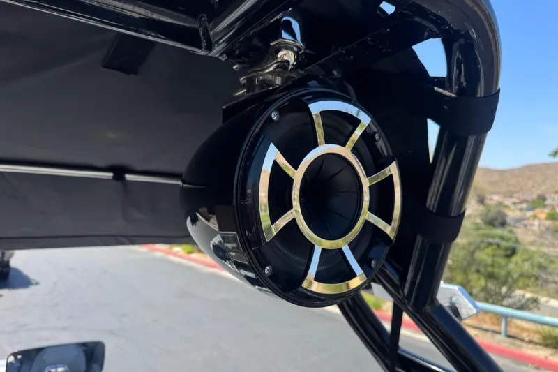 Slide: The Image of Close-up of a 2022 Moomba Max boat speaker mounted on a black frame. - 15