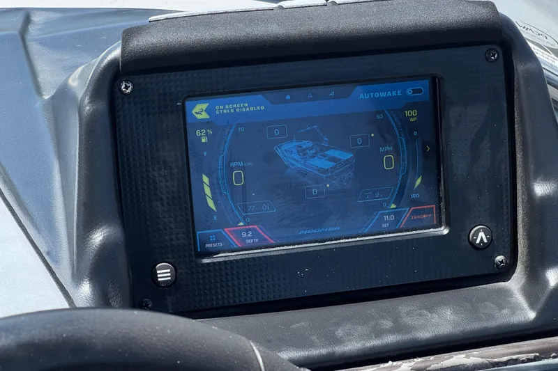 Slide: The Image of 2022 Moomba Max dashboard display showing boat controls and settings. - 28
