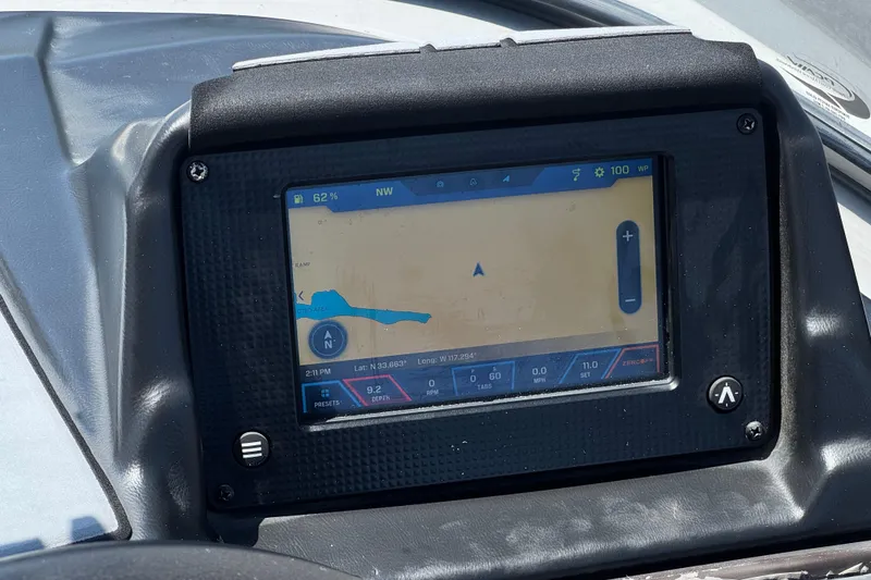 Slide: The Image of Dashboard display of 2022 Moomba Max boat showing navigation map and controls. - 30