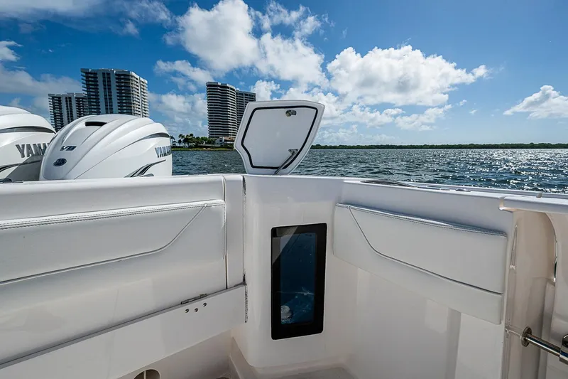 Slide: The Image of Intrepid 345 Nomad FE 2020 boat with Yamaha engines on a sunny day. - 45