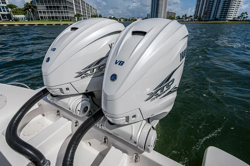 Slide: The Image of Twin Yamaha XTO Offshore V8 engines on a 2020 Intrepid 345 Nomad FE boat. - 59