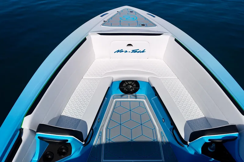 Slide: The Image of 2026 Nor-Tech 390 Sport Center Console boat with sleek seating and modern design. - 11