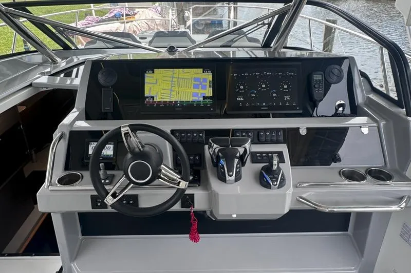 Slide: The Image of Cockpit of 2022 Jeanneau Leader 12.5 WA with modern navigation controls. - 21