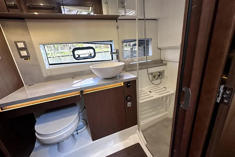 Slide: The Image of Luxurious bathroom interior of 2022 Jeanneau Leader 12.5 WA yacht with modern fixtures. - 25