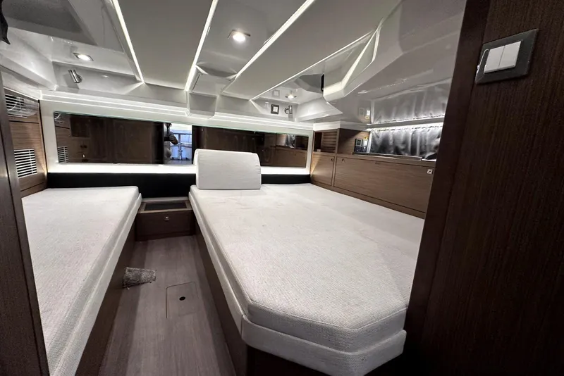 Slide: The Image of Interior of 2022 Jeanneau Leader 12.5 WA boat, featuring modern cabin design. - 31