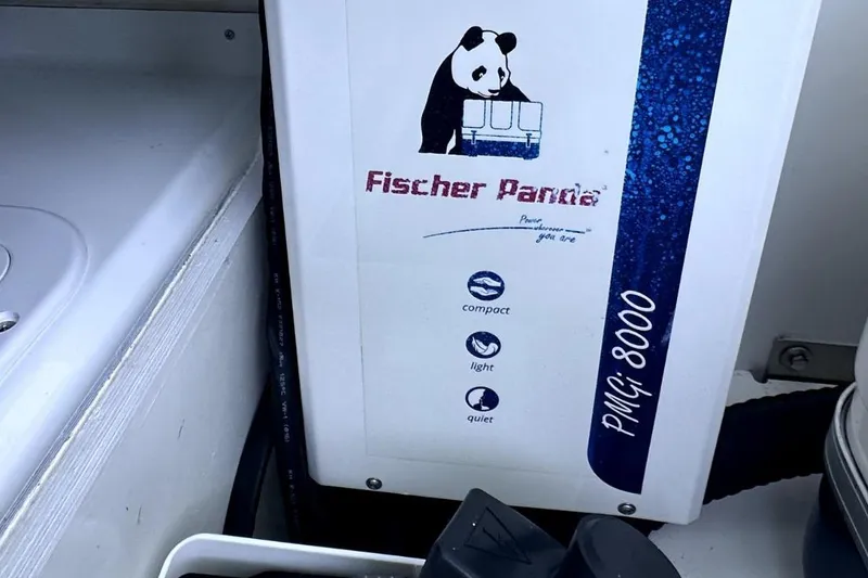 Slide: The Image of Fischer Panda generator in Jeanneau Leader 12.5 WA, 2022 model, showcasing compact and quiet design. - 36