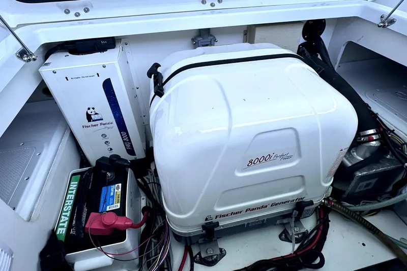 Slide: The Image of Engine compartment of 2022 Jeanneau Leader 12.5 WA with Fischer Panda generator and Interstate battery. - 37