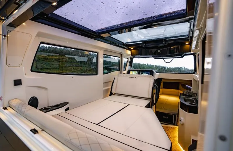 Slide: The Image of Luxurious interior of 2025 Navan C30 camper van with panoramic roof and modern amenities. - 14