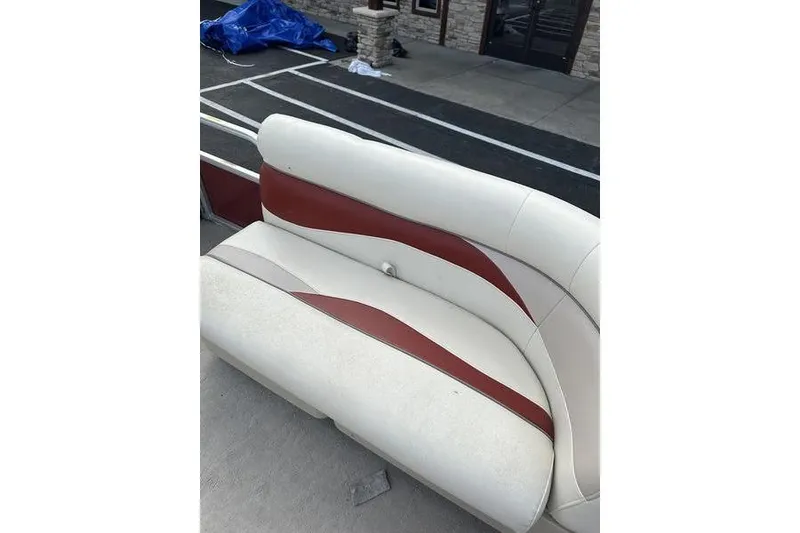 Slide: The Image of 2014 Godfrey Sweetwater 2086 C boat seat with red and white upholstery. - 17