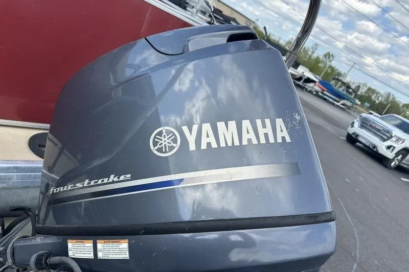 Slide: The Image of Yamaha four-stroke engine on a 2014 Godfrey Sweetwater 2086 C boat. - 5