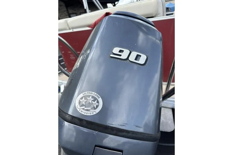Slide: The Image of Outboard motor with "90" label on a 2014 Godfrey Sweetwater 2086 C boat. - 7