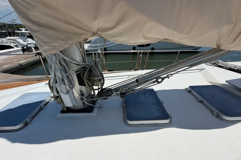 Slide: The Image of Deck view of 1980 Amel Mango 52 sailboat with rigging and hatches. - 20