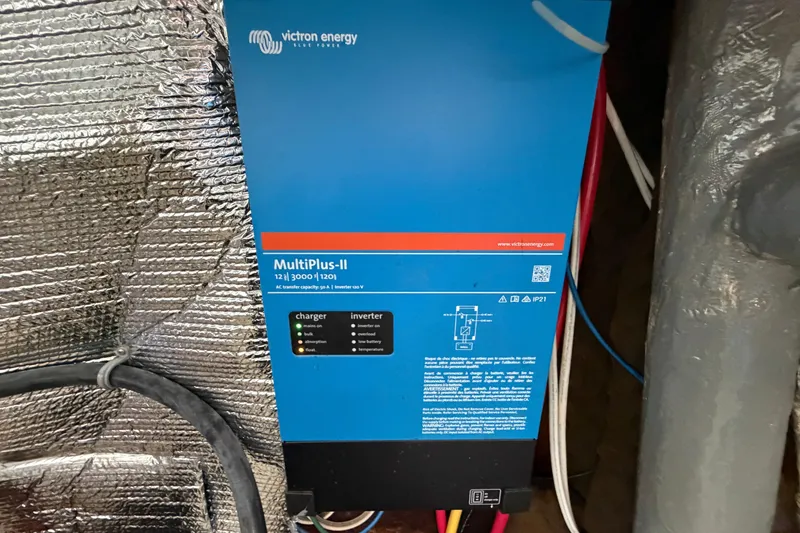 Slide: The Image of Victron Energy MultiPlus-II inverter charger on Amel Mango 52 yacht, 1980 model. - 62