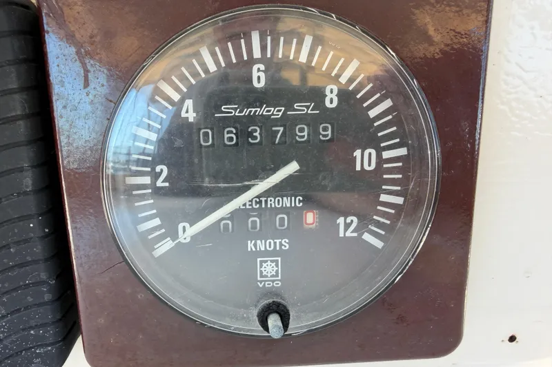 Slide: The Image of Speedometer of 1980 Amel Mango 52 yacht, displaying 6.3799 knots. - 65