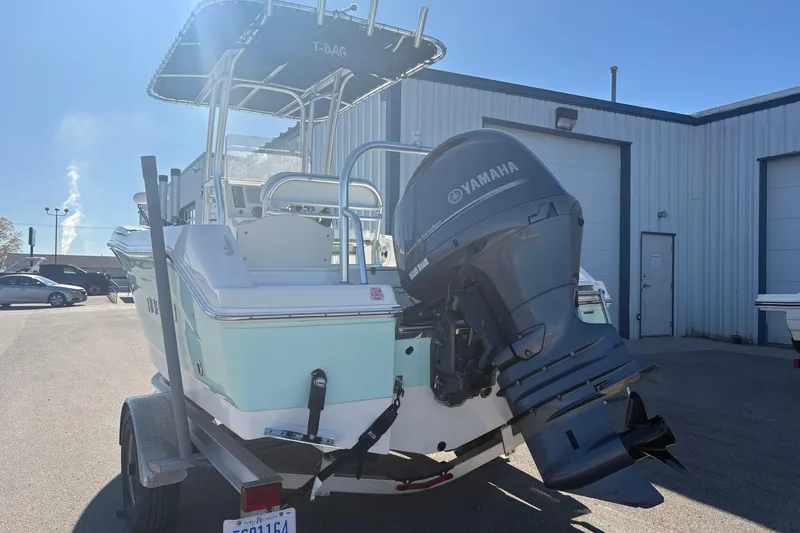 Slide: The Image of 2019 Robalo R180 Center Console boat with Yamaha outboard motor on trailer. - 4
