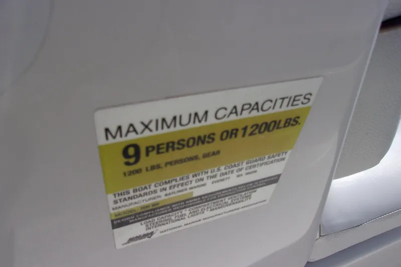 Slide: The Image of 2003 Bayliner 205 capacity label: 9 persons or 1200 lbs maximum. - 15