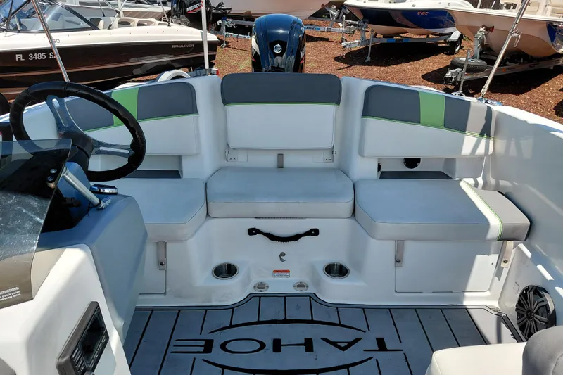 Slide: The Image of Interior of 2023 Tahoe T18 boat with seating and steering wheel. - 24