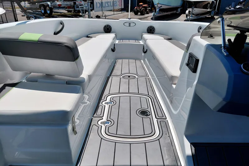Slide: The Image of 2023 Tahoe T18 boat interior with sleek seating and modern design. - 29