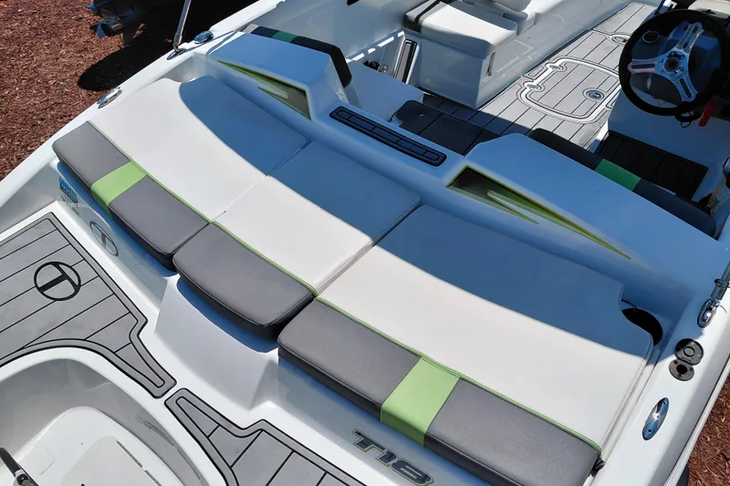 Slide: The Image of 2023 Tahoe T18 boat interior with stylish seating and modern design elements. - 39
