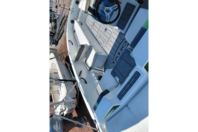 Slide: The Image of 2023 Tahoe T18 boat interior with seating and steering wheel. - 45