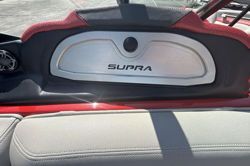 Slide: The Image of 2016 Supra SE 550 interior detail with logo and stylish upholstery. - 18