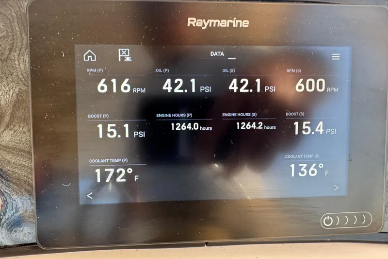 Slide: The Image of Raymarine display showing engine data for 2003 Silverton 410 Sport Bridge. - 38