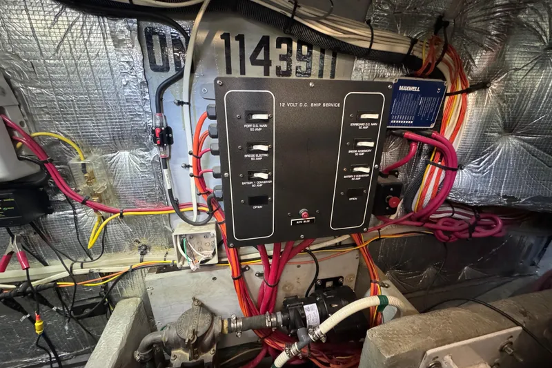 Slide: The Image of Electrical panel and wiring inside a 2003 Silverton 410 Sport Bridge boat. - 39