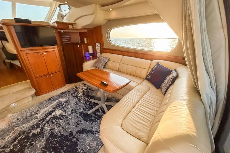Slide: The Image of Luxurious interior of 2003 Silverton 410 Sport Bridge yacht with leather seating and ocean view. - 69