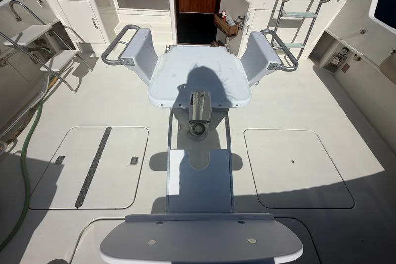 Slide: The Image of Interior of 1985 Hatteras 52 Convertible yacht with kitchen and living area. - 17