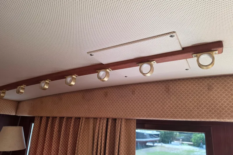 Slide: The Image of Cozy cabin interior of 1985 Hatteras 52 Convertible with bunk beds and shoe organizer. - 29