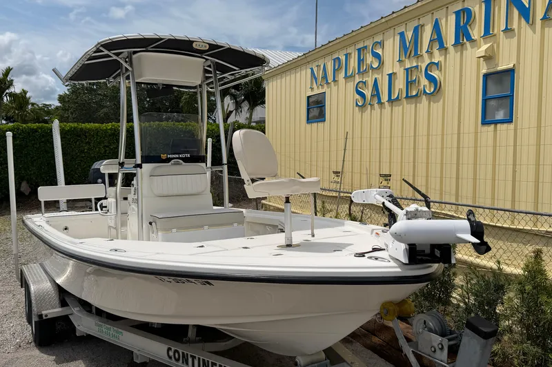 Slide: The Image of 2017 Mako 21 LTS boat on trailer at Naples Marine Sales. - 2