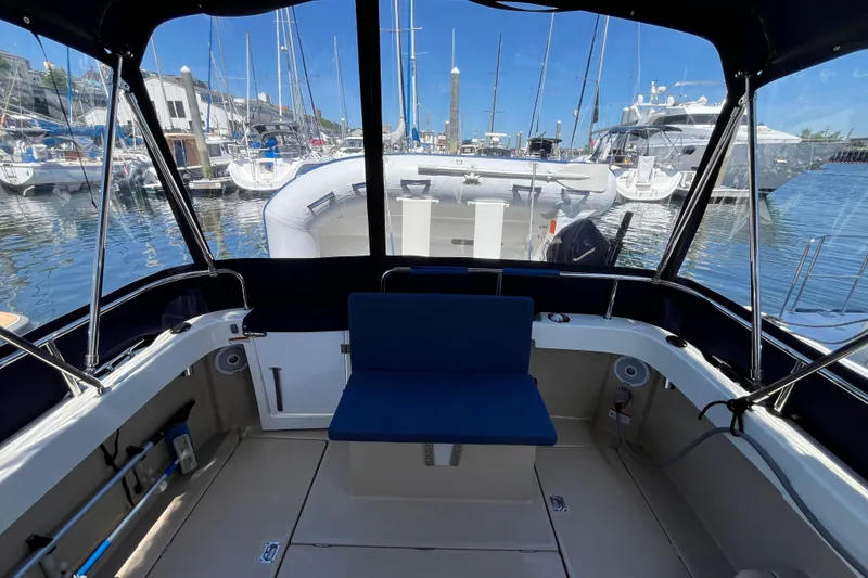 Slide: The Image of Interior view of 2017 Ranger Tugs R-27 boat docked at a marina. - 10