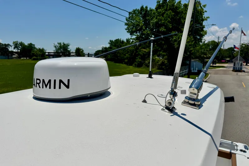 Slide: The Image of 2024 Sea Hunt Gamefish 27 Coffin Box with Garmin radar and antennas on deck. - 17